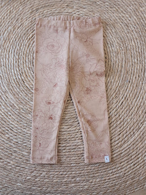 Broekje oranje lijn bloemen