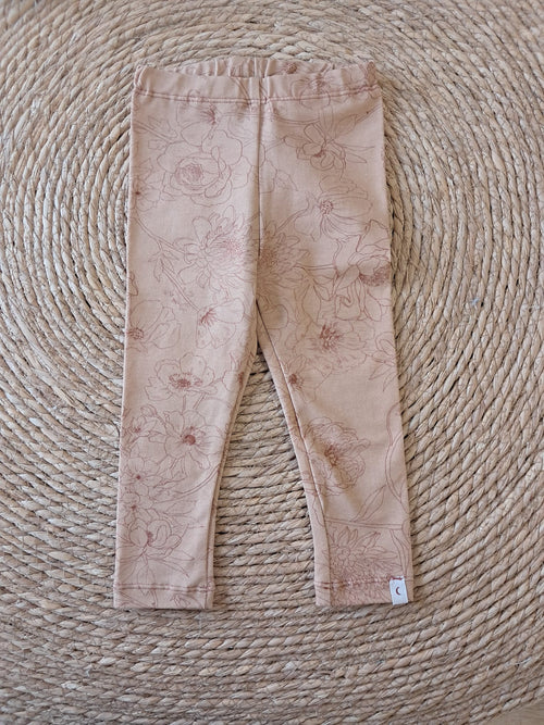 Broekje oranje lijn bloemen